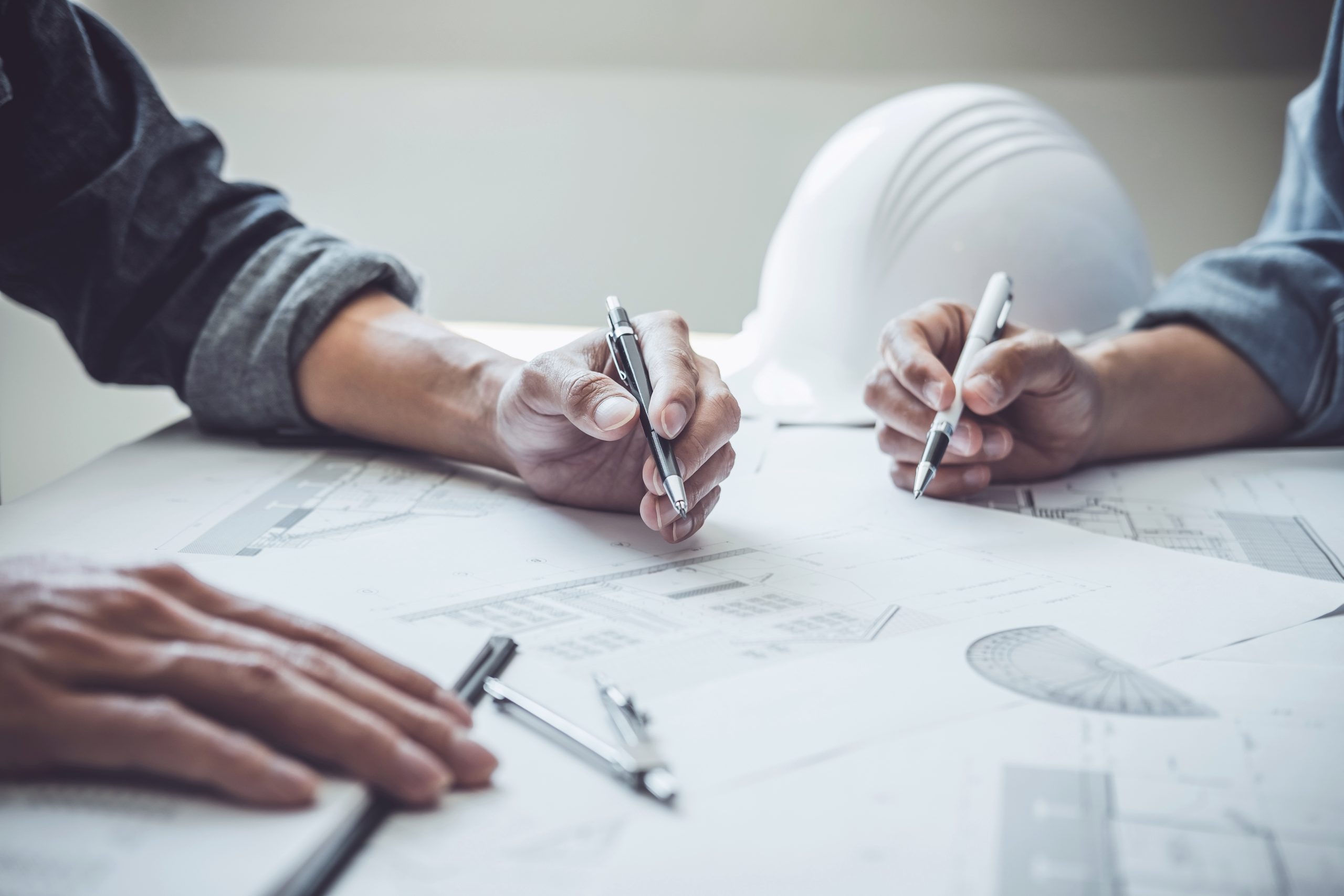 Architecture Engineer Teamwork Meeting, Drawing and working for